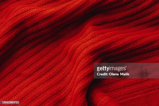 texture of knitted red sweater. flat lay style - tank top stock pictures, royalty-free photos & images
