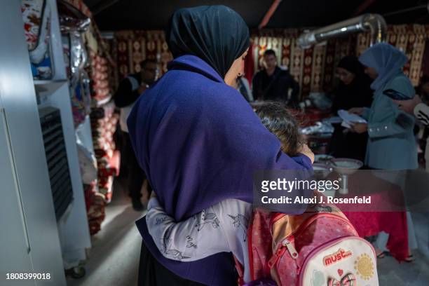 Mother hugs her daughter after she runs in during a media tour on November 22, 2023 in El Bhat Al Rabi, Israel. On October 7, Hamas launched a...