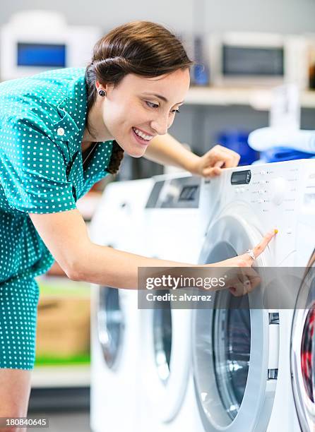 what a great washing machine - buying washing machine stockfoto's en -beelden