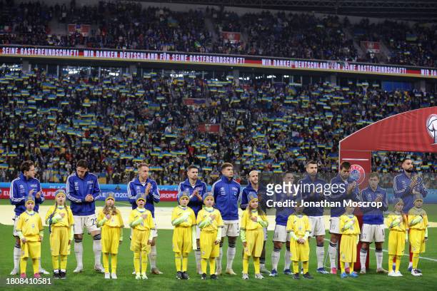 The Italy team applauds as the Ukraine National Anthem is played prior to kick off during the UEFA EURO 2024 European qualifier match between Ukraine...