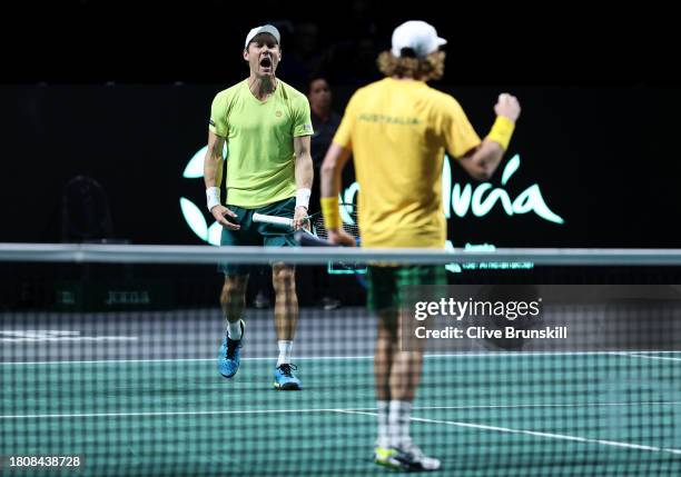 Matthew Ebden and Max Purcell of Australia celebrate winning match point in the Davis Cup Quarter Final doubles match against Jiri Lehecka and Adam...