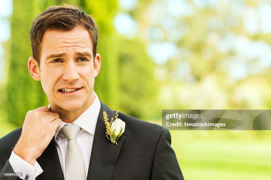 Nervous Groom In Garden