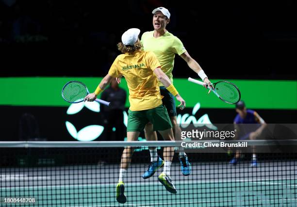 Matthew Ebden and Max Purcell of Australia celebrate winning match point in the Davis Cup Quarter Final doubles match against Jiri Lehecka and Adam...