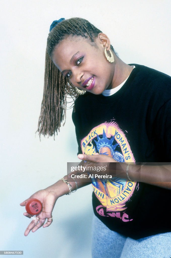 Yoyo Rapper Rapper Braids Rapper Yo-Yo plays with a toy yo-yo when she appears in a portrait ...