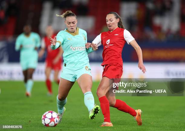 Kristyna Ruzickova of Slavia Praha challenges for the ball with