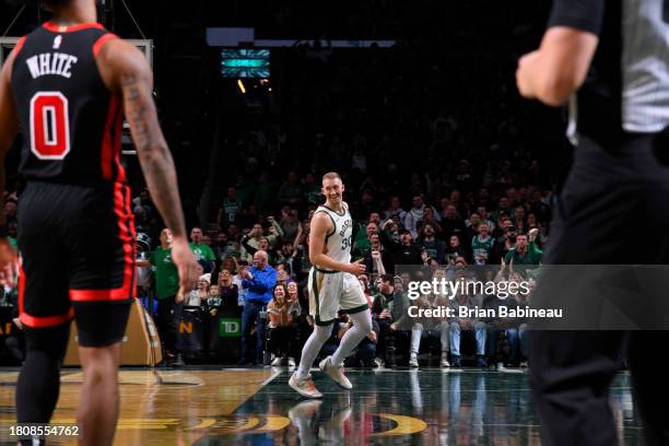 Sam Hauser of the Boston Celtics smiles during the game against the Chicago Bulls during the In-Season Tournament on November 28, 2023 at the TD...