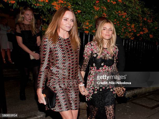 Stella McCartney and Sienna Miller are sighted leaving Park Lane on September 16, 2013 in London, England.
