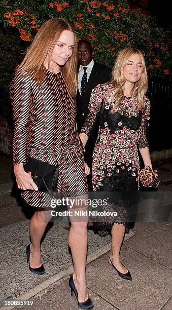 Stella McCartney and Sienna Miller are sighted leaving Park Lane on September 16, 2013 in London, England.