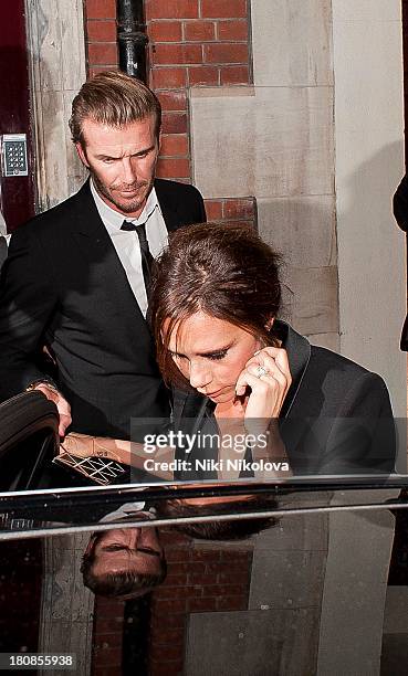 David Beckham and Victoria Beckham are sighted leaving lulu Restaurant, Mayfair on September 16, 2013 in London, England.