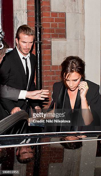 David Beckham and Victoria Beckham are sighted leaving lulu Restaurant, Mayfair on September 16, 2013 in London, England.