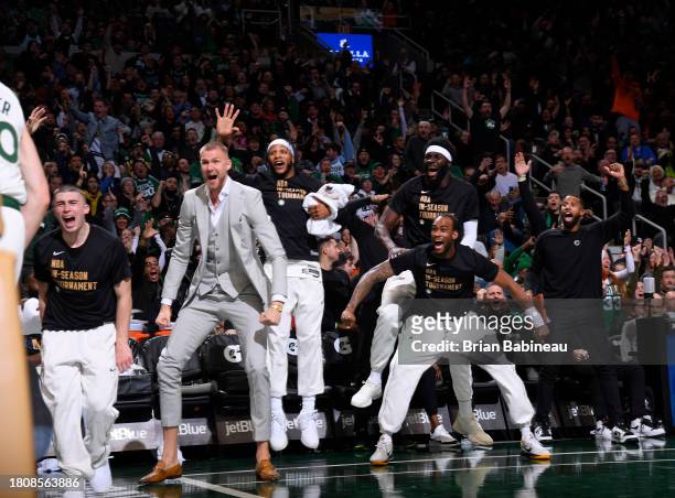 Boston Celtics bench celebrates during the game against the Chicago Bulls during the In-Season Tournament on November 28, 2023 at the TD Garden in...