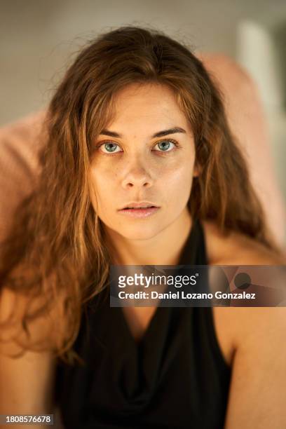 pensive young long haired woman looking at camera - morning sickness stock-fotos und bilder