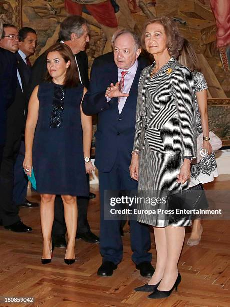 Queen Sofia of Spain and Soraya Saenz de Santamaria attend the opening of the painting exhibition 'De El Bosco a Tiziano. Arte y maravilla en El...