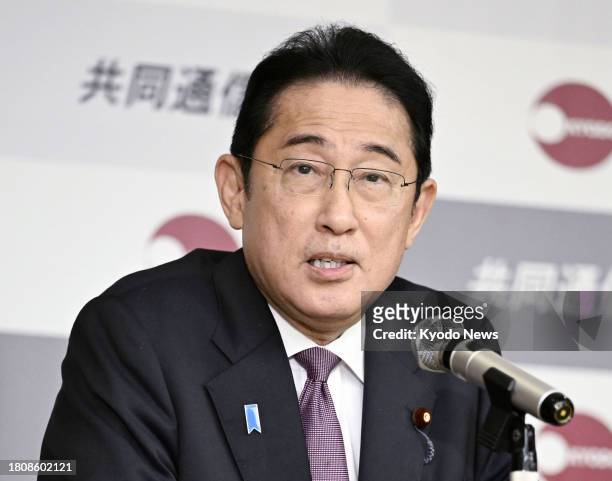 Japanese Prime Minister Fumio Kishida delivers a speech at Kyodo News headquarters in Tokyo on Nov. 28, 2023.