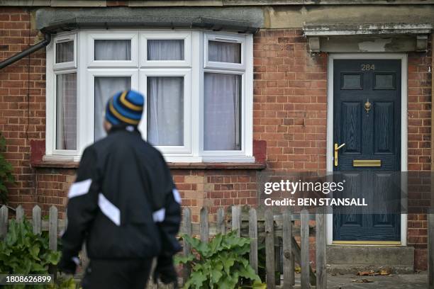 Photograph taken on November 24, 2023 shows the 284 Green Street also called Poltergeist House, in Enfield. In an ordinary house in a north London...