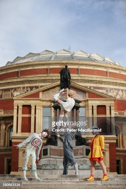 The cast of Quidam from Cirque de Soleil perform outside the Royal Albert Hall on September 17, 2013 in London, England. Quidam, a story of a bored...