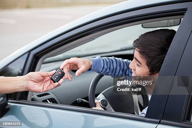 teen driver getting car keys - teenage boy looking out window stock pictures, royalty-free photos & images