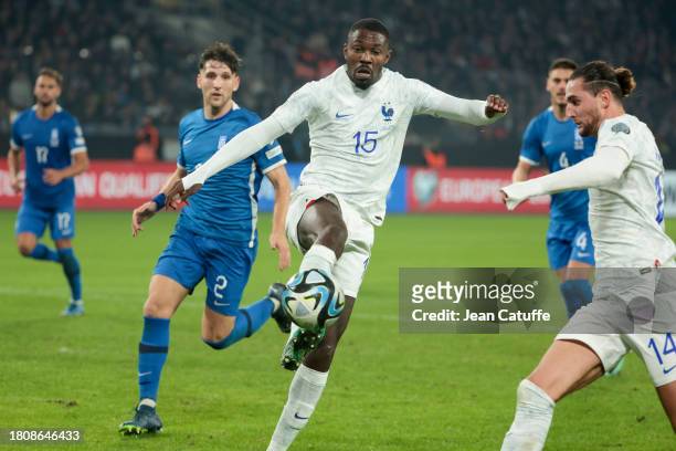 Marcus Thuram, Adrien Rabiot of France in action during the UEFA EURO 2024 European qualifier match between Greece and France at OPAP Arena, Agia...