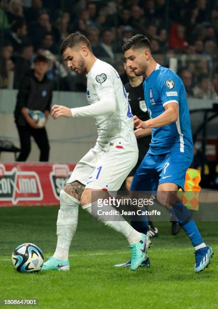 Lucas Hernandez of France, Giorgos Masouras of Greece in action during the UEFA EURO 2024 European qualifier match between Greece and France at OPAP...