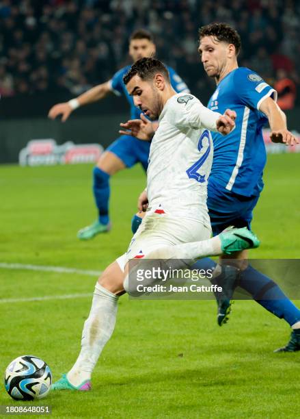 Theo Hernandez of France, Panagiotis Retsos of Greece in action during the UEFA EURO 2024 European qualifier match between Greece and France at OPAP...