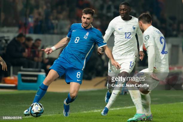 Fotis Ioannidis of Greece, Rando Kolo Muani of France in action during the UEFA EURO 2024 European qualifier match between Greece and France at OPAP...