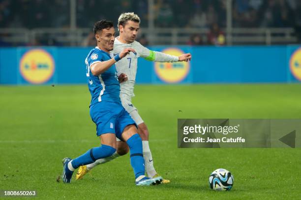 Dimitris Giannoulis of Greece, Antoine Griezmann of France in action during the UEFA EURO 2024 European qualifier match between Greece and France at...