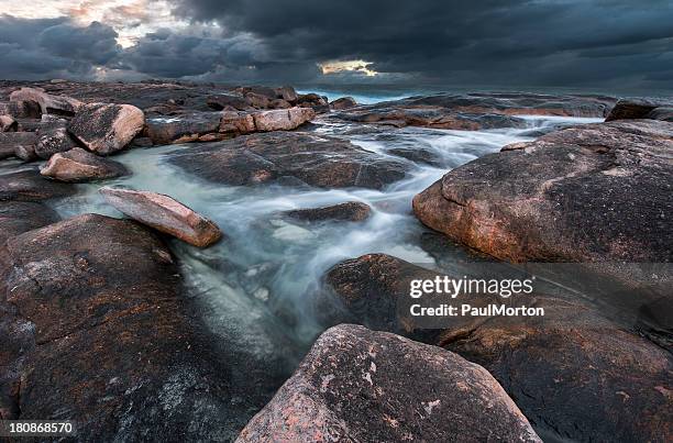 rocky coast during a storm, western australia - margaret river stock pictures, royalty-free photos & images