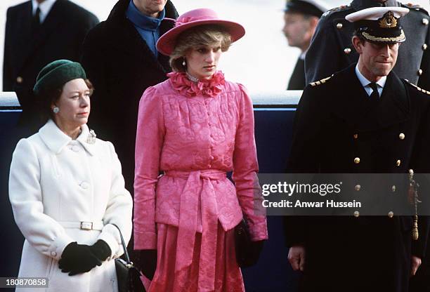 Diana, Princess of Wales stands between Princess Margaret and Prince Charles, Prince of Wales to await the arrival of Queen Beatrix of the...