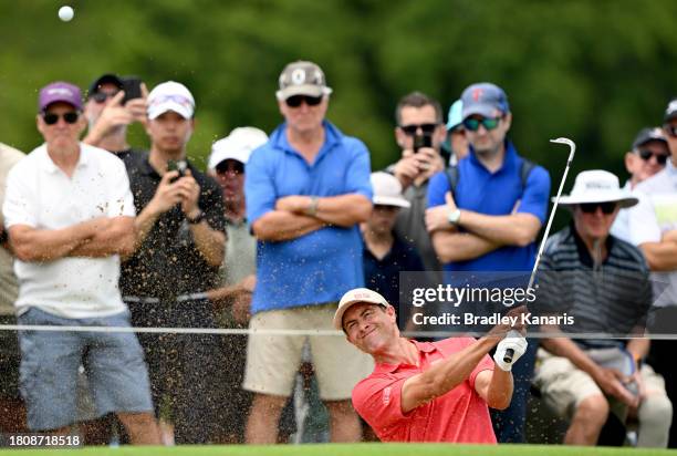 Adam Scott plays a shot out of the bunker on the 9th hole during day one of the 2023 Australian PGA Championship at Royal Queensland Golf Club on...