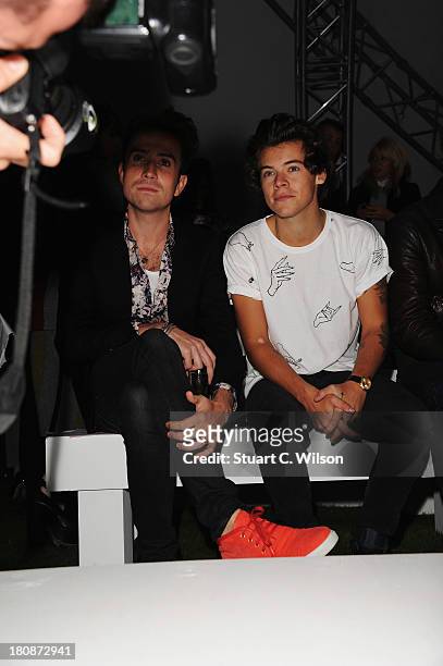 Nick Grimshaw and Harry Styles attend the Fashion East show during London Fashion Week SS14 at TopShop Show Space on September 17, 2013 in London,...