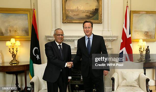 Britain's Prime Minister David Cameron meets Libya's Prime Minister Ali Zeidan inside 10 Downing Street on September 17, 2013 in London, England.