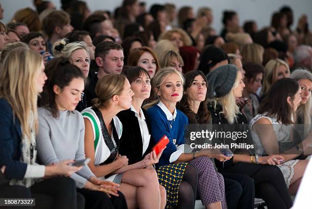 Model walks the runway at the Simone Rocha show during London Fashion Week SS14 at TopShop Show Space on September 17, 2013 in London, England.