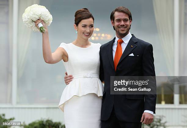 Prince Felix Of Luxembourg and Princess Claire of Luxembourg pose in front of photograhers after taking their vows at their Civil Wedding Ceremony at...