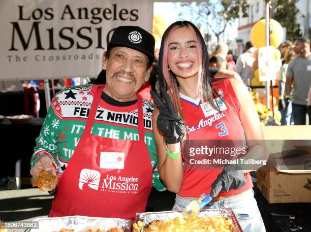 Danny Trejo and Kylie Cantrall attend Los Angeles Mission's Celebrity Thanksgiving at Los Angeles Mission on November 22, 2023 in Los Angeles,...