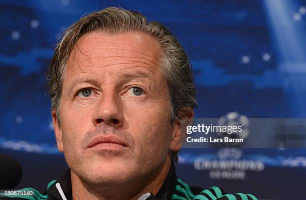 Head coach Jens Keller looks on during a FC Schalke 04 press conference ahead of their UEFA Champions League Group E match against FC Steaua...