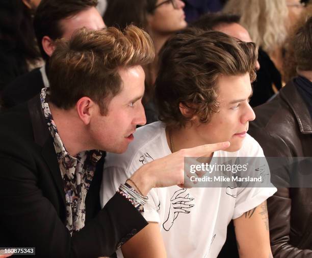 Harry Styles and Nick Grimshaw attend the Fashion East show at London Fashion Week SS14 on September 17, 2013 in London, England.