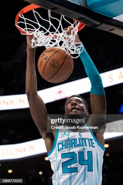 Brandon Miller of the Charlotte Hornets dunks the ball in the third quarter during their game against the Washington Wizards at Spectrum Center on...