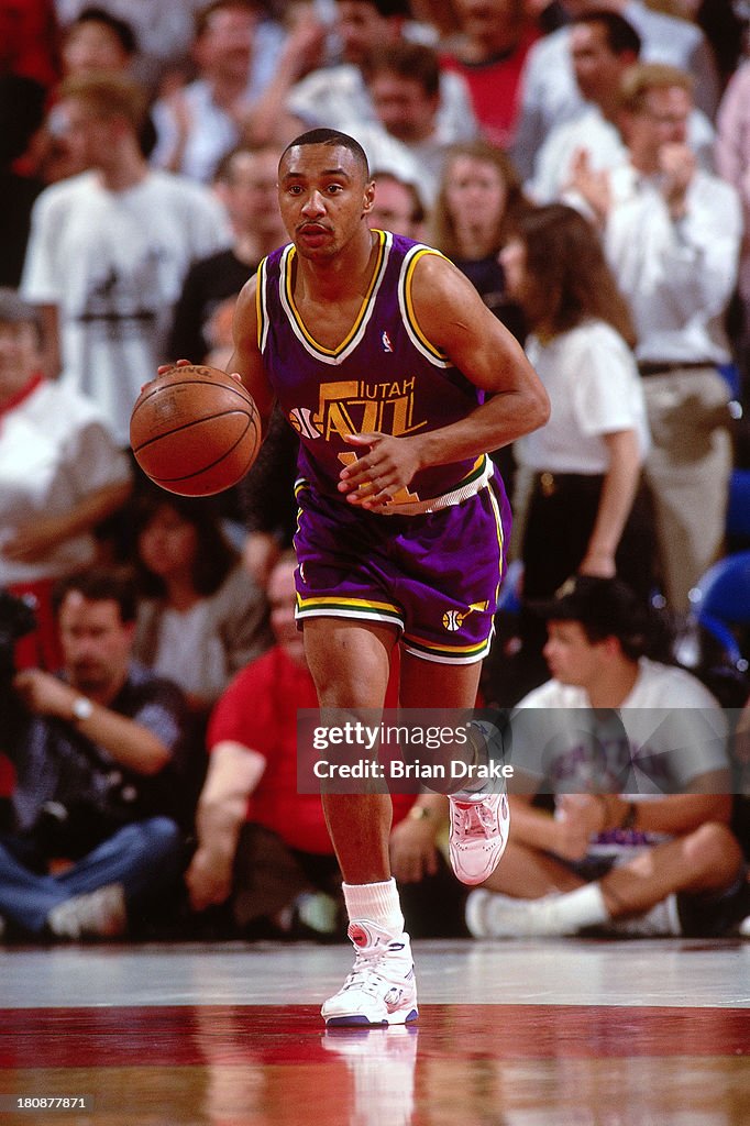 Dean Rudd Delaney Rudd of the Utah Jazz brings the ball up court during a game ...