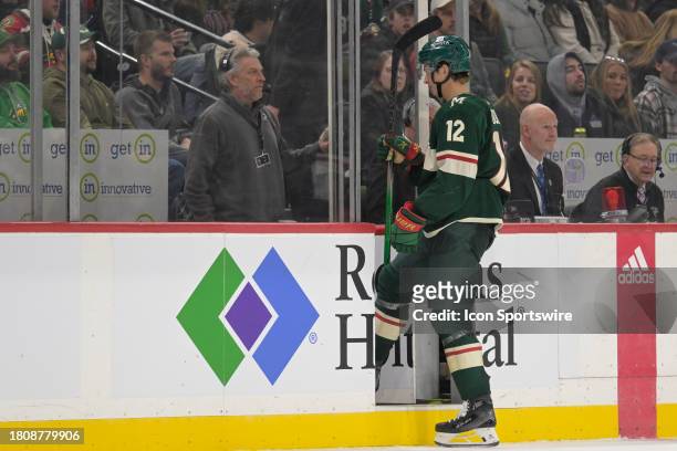 Minnesota Wild forward Matt Boldy heads to the penalty box on a 4-minute double minor for high-sticking during the third period of an NHL game...