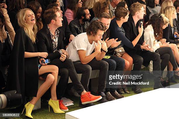 Poppy Delevingne, Nick Grimshaw, Harry Styles and Pixie Geldof seen at a Fashion East fashion show on September 17, 2013 in London, England.