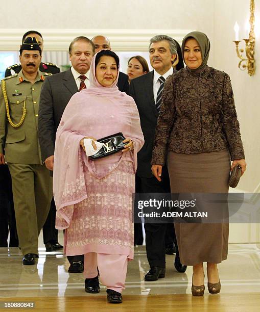 Turkish President Abdullah Gul , Pakistani Prime Minister Nawaz Sharif and their spouses Kalsoom Nawaz Sharif and Hayrunnisa Gul attend the Order of...