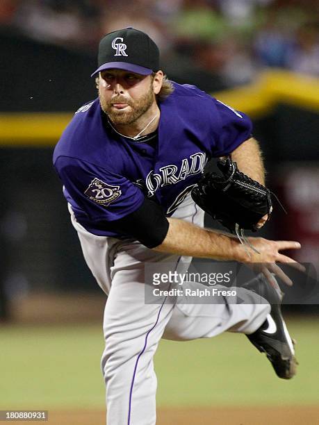 Mitchell Boggs of the Colorado Rockies delivers a pitch against the Arizona Diamondbacks during the sixth inning of a MLB game at Chase Field on...