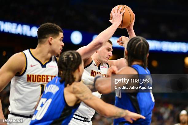 Nikola Jokic of the Denver Nuggets grabs a defensive rebound in the second half of a game against the Orlando Magic at Amway Center on November 22,...