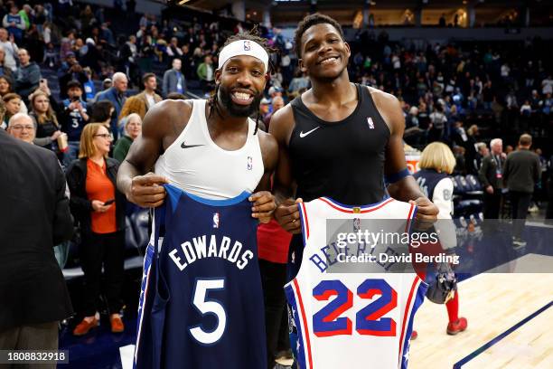 Patrick Beverley of the Philadelphia 76ers and Anthony Edwards of the Minnesota Timberwolves pose for a photo after swapping jerseys after the game...