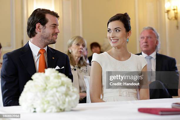 In this handout image provided by the Grand-Ducal Court of Luxembourg, Prince Felix Of Luxembourg and Claire Lademacher attend their Civil Wedding at...