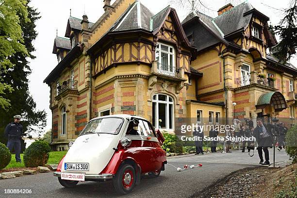 Prince Felix Of Luxembourg and Princess Claire of Luxembourg leave Villa Rothschild in a BMW Isetta after taking their vows at their Civil Wedding...