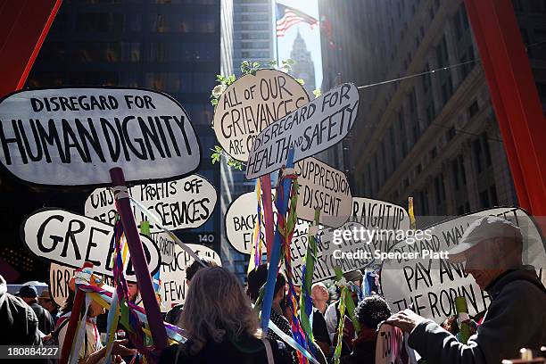 Protesters affiliated with Occupy Wall Street demonstrate for a variety of causes at Zuccotti Park near the New York Stock Exchange on the second...