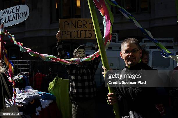 Protesters affiliated with Occupy Wall Street demonstrate for a variety of causes at Zuccotti Park near the New York Stock Exchange on the second...