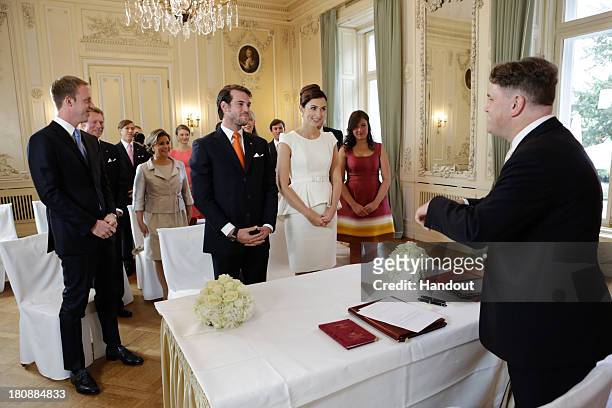 In this handout image provided by the Grand-Ducal Court of Luxembourg, Prince Felix Of Luxembourg and Claire Lademacher attend their Civil Wedding at...