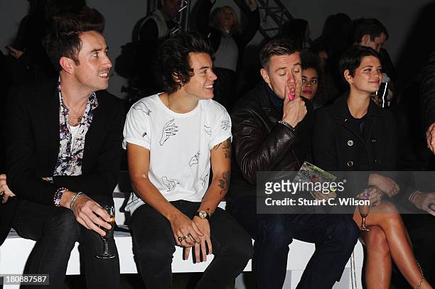 Nick Grimshaw, Harry Styles and Pixie Geldof attend the Fashion East show during London Fashion Week SS14 at TopShop Show Space on September 17, 2013...